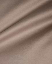 Men's Oscar Oversized Tee in premium, soft taupe jersey knit fabric, featuring a smooth texture with subtle horizontal ribbing and a relaxed drape, ideal for refined streetwear. (6)