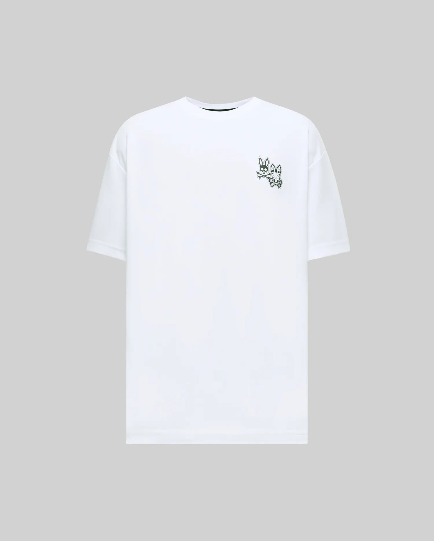 White Mens Luke Back Graphic Tee, a relaxed fit jersey t-shirt with a small, dark green embroidered Psycho Bunny logo depicting two bunny skulls and crossbones on the left chest.
