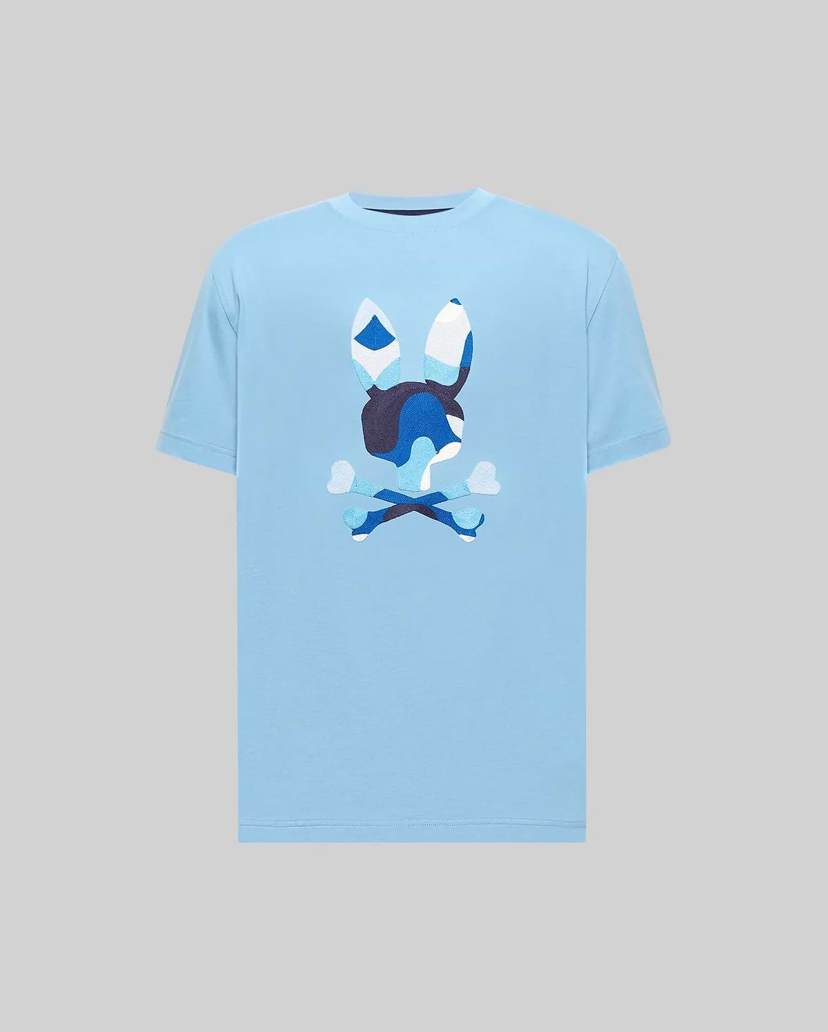 Mens Ara Graphic Tee in light blue, featuring a large central blue camouflage Psycho Bunny skull graphic on soft jersey knit with a classic fit.