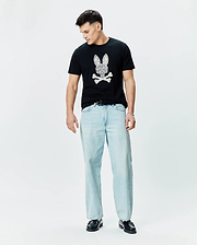 Mens Brad Graphic Tee, black classic fit jersey t-shirt featuring a large white paisley-filled Psycho Bunny skull logo on the chest.