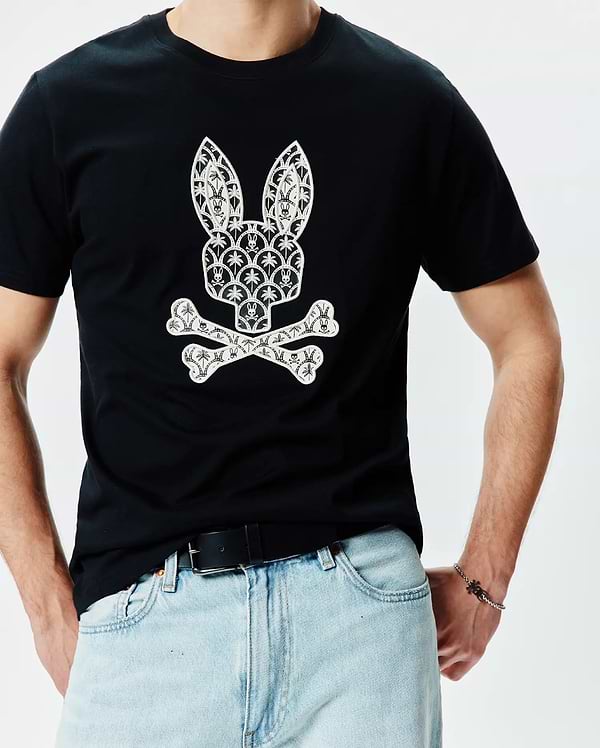 Mens Brad Graphic Tee, black classic fit smooth jersey t-shirt with a large white central Psycho Bunny skull and crossbones logo graphic, detailed with small bunny skulls and palm trees.