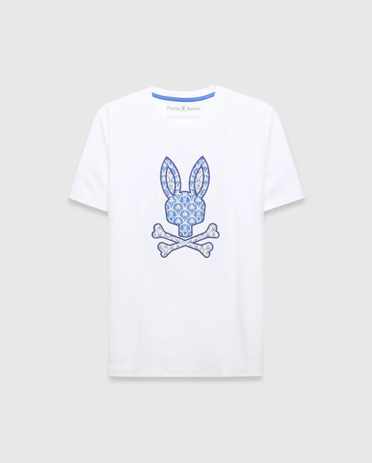White Mens Brad Graphic Tee, classic fit jersey with a large central blue and cream patterned bunny skull logo and blue Psycho Bunny neck tape.