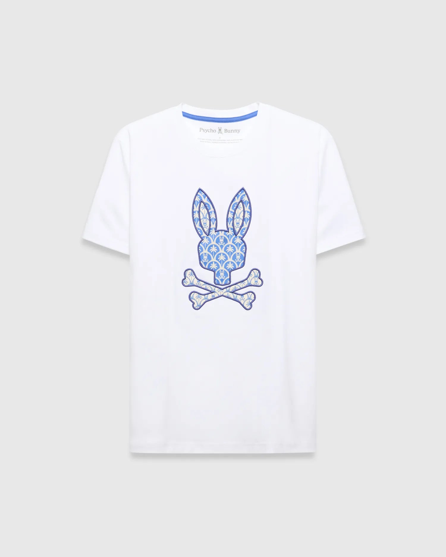 White Mens Brad Graphic Tee, classic fit jersey with a large central blue and cream patterned bunny skull logo and blue Psycho Bunny neck tape.