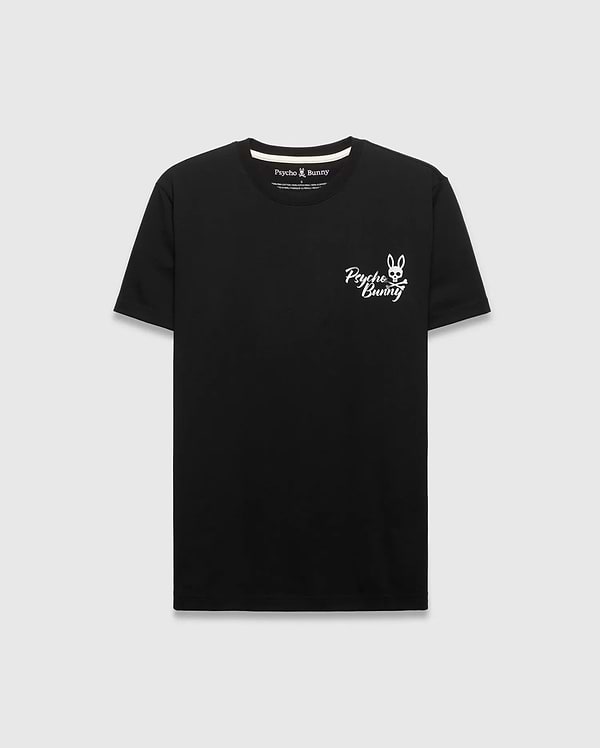 Black Mens Colin Back Graphic Tee, a classic fit jersey t-shirt, features a small white Psycho Bunny skull and crossbones logo with script text on the left chest.