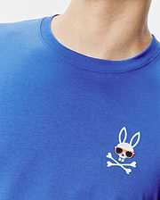 Royal blue classic fit jersey knit T-shirt featuring a small, embroidered Psycho Bunny skull logo with orange sunglasses and white crossbones on the left chest. Mens Sunny Chest Graphic Tee.