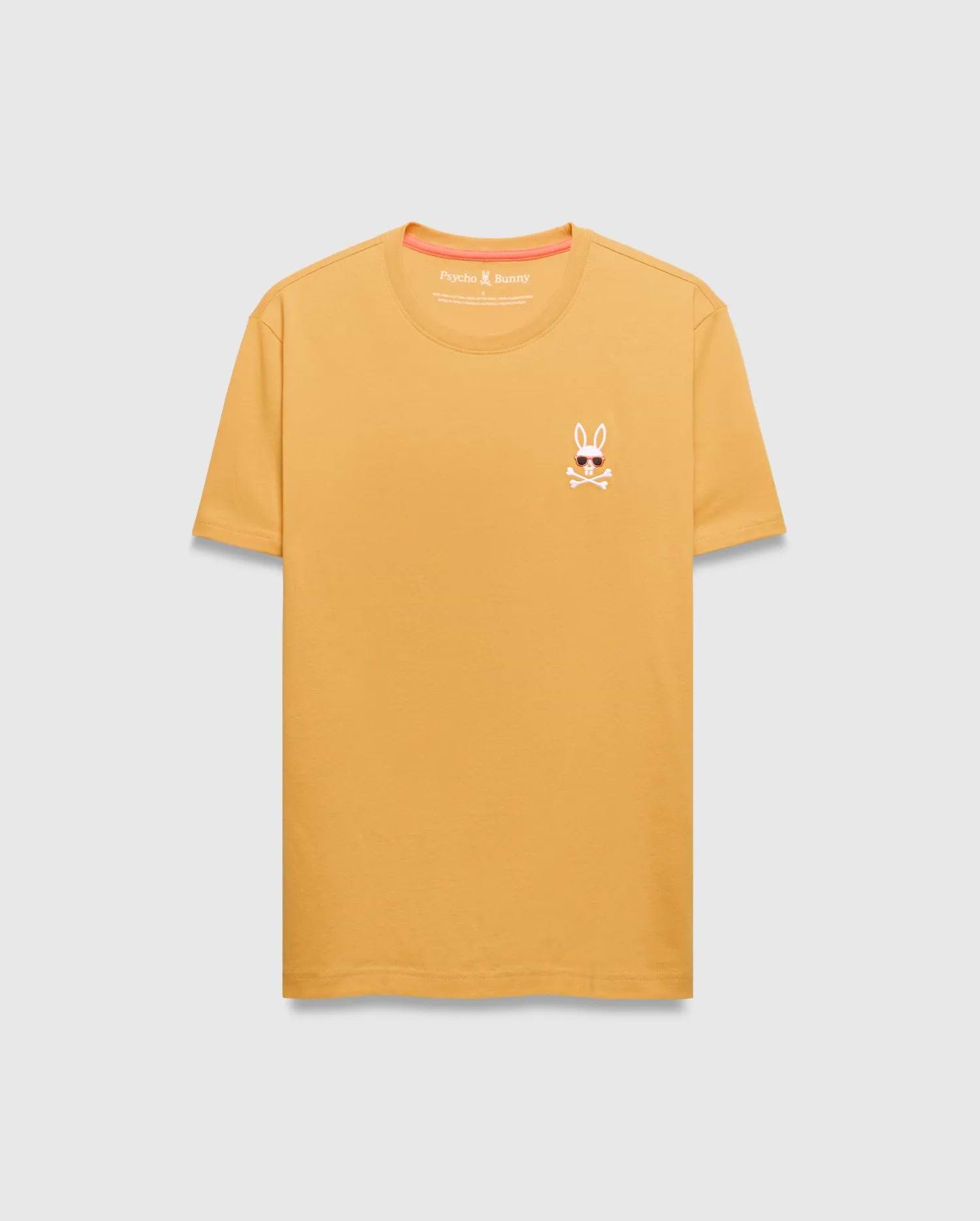 Mens Sunny Chest Graphic Tee. Golden yellow classic fit jersey t-shirt with a small embroidered Psycho Bunny skull logo wearing sunglasses on the left chest, featuring orange neck tape.