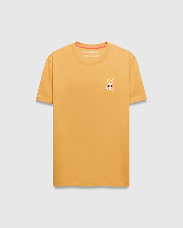 Mens Sunny Chest Graphic Tee. Golden yellow classic fit jersey t-shirt with a small embroidered Psycho Bunny skull logo wearing sunglasses on the left chest, featuring orange neck tape.