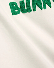 Mens Craig Wordmark Tee in soft off-white jersey, showcasing a bold, large green textured chenille BUNNY wordmark prominently embroidered on the chest, embodying refined streetwear.