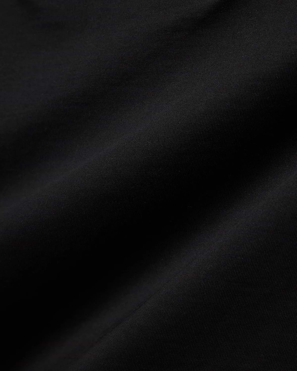 Black Mens Craig Graphic Tee, a premium Psycho Bunny garment crafted from soft, luxurious, subtly textured jersey knit fabric, featuring an iconic Psycho Bunny graphic.