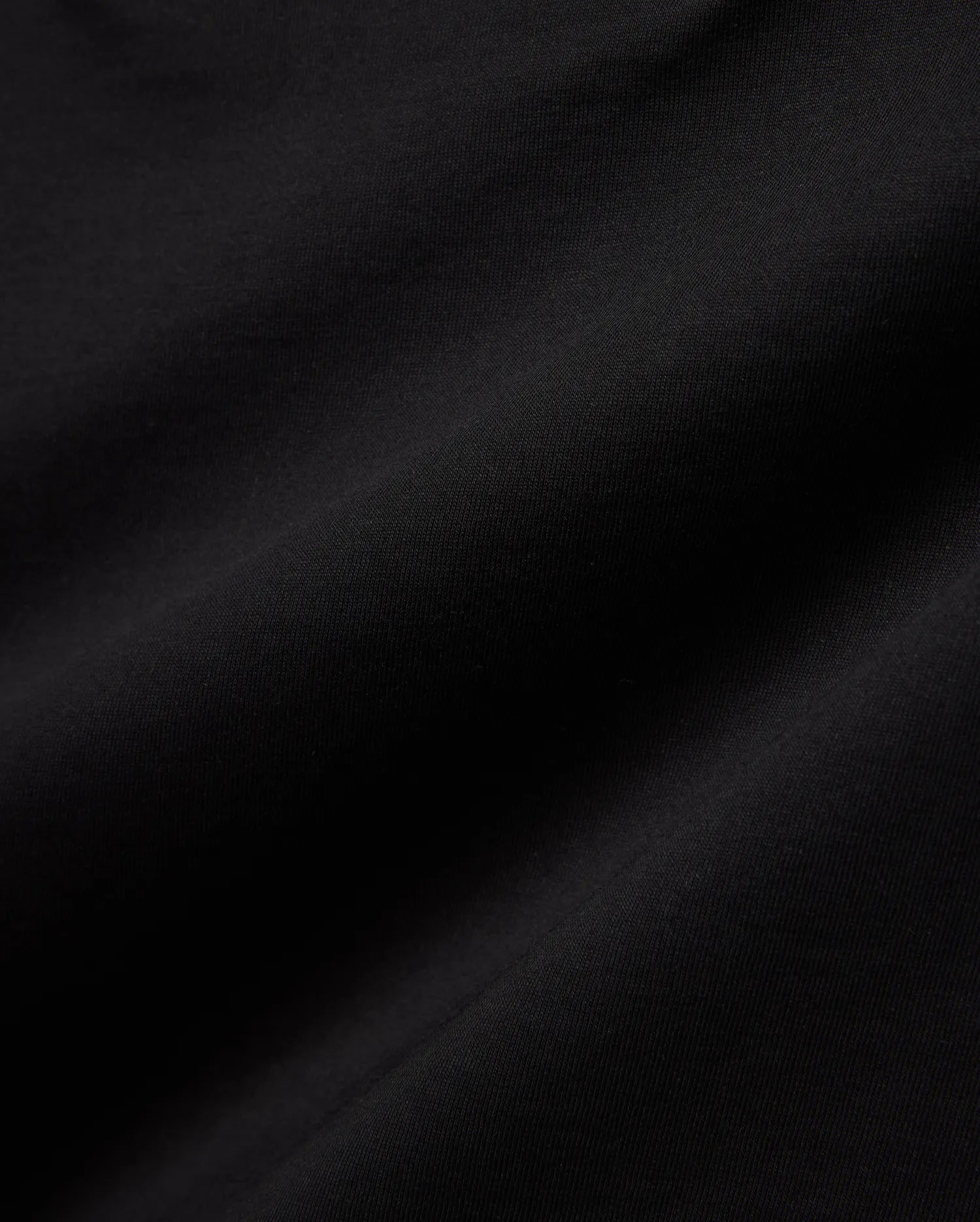 Black Mens Craig Graphic Tee, a premium Psycho Bunny garment crafted from soft, luxurious, subtly textured jersey knit fabric, featuring an iconic Psycho Bunny graphic.