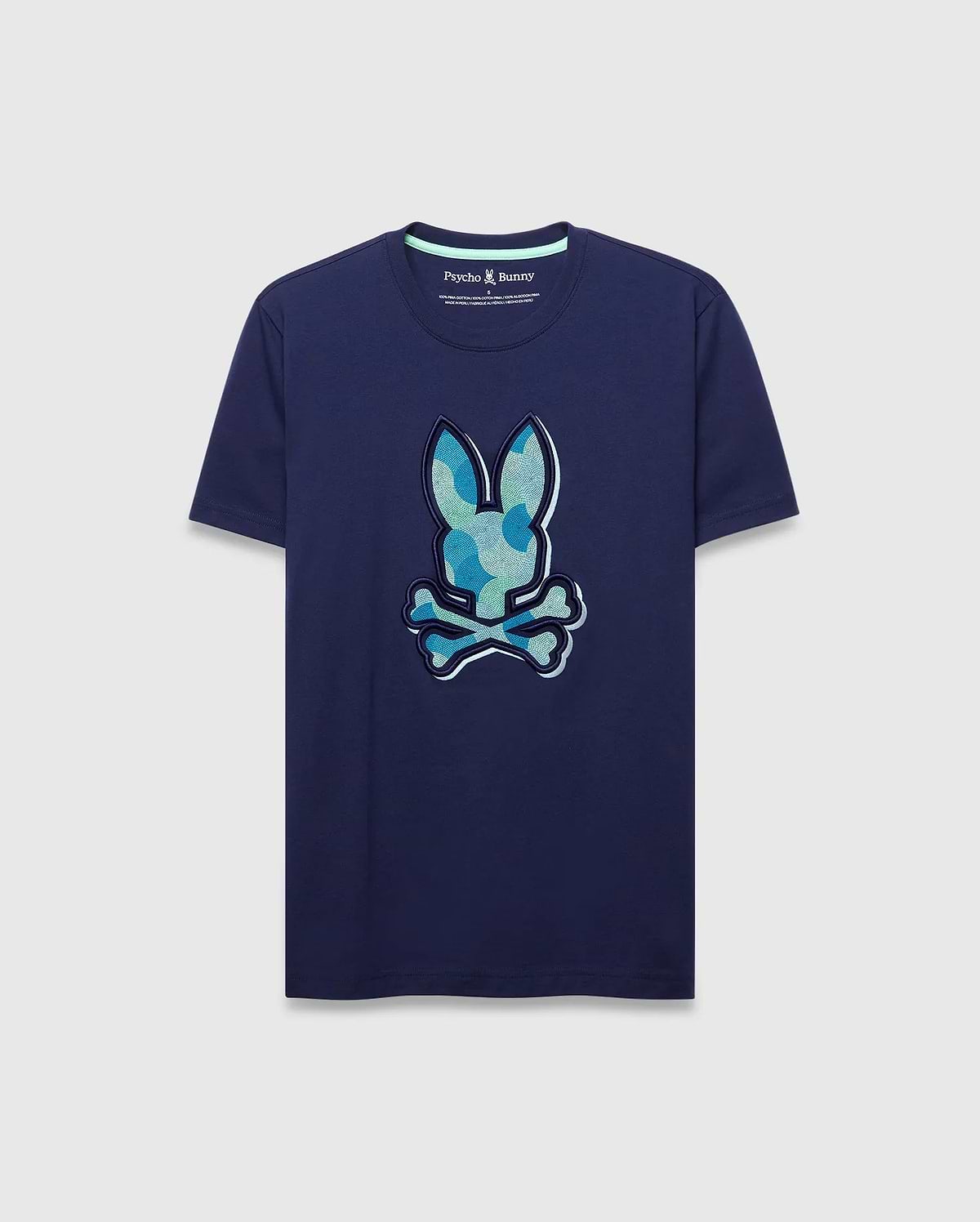Mens Ethan Graphic Tee. Navy blue classic fit jersey t-shirt with a large center chest Psycho Bunny skull logo featuring a blue and green camouflage pattern and light blue outline. (1)