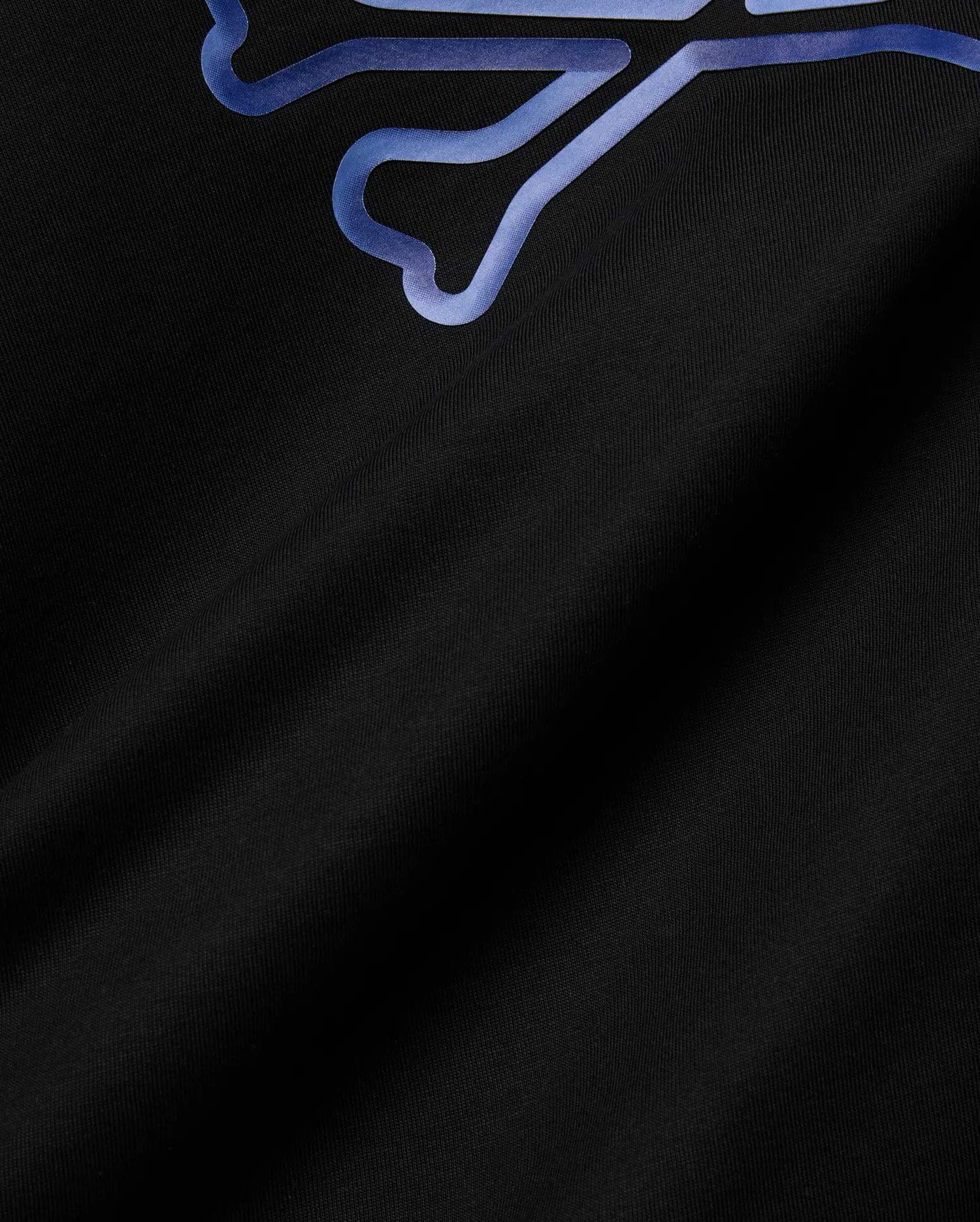Mens Dayton Graphic Tee in black jersey knit, featuring a large, partial blue-purple gradient Psycho Bunny skull graphic print on the upper left, offering a classic fit. (6)