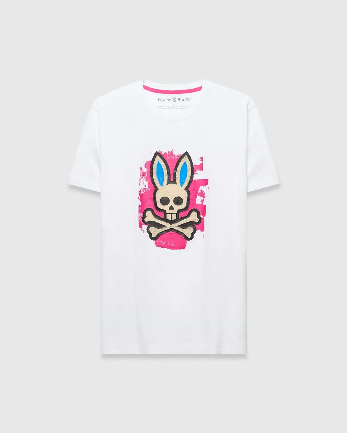 Mens Marcus Bunny Graphic Tee, white classic fit jersey t-shirt with a large distressed pink, blue, black, and beige Psycho Bunny skull graphic on the chest and pink neck tape.