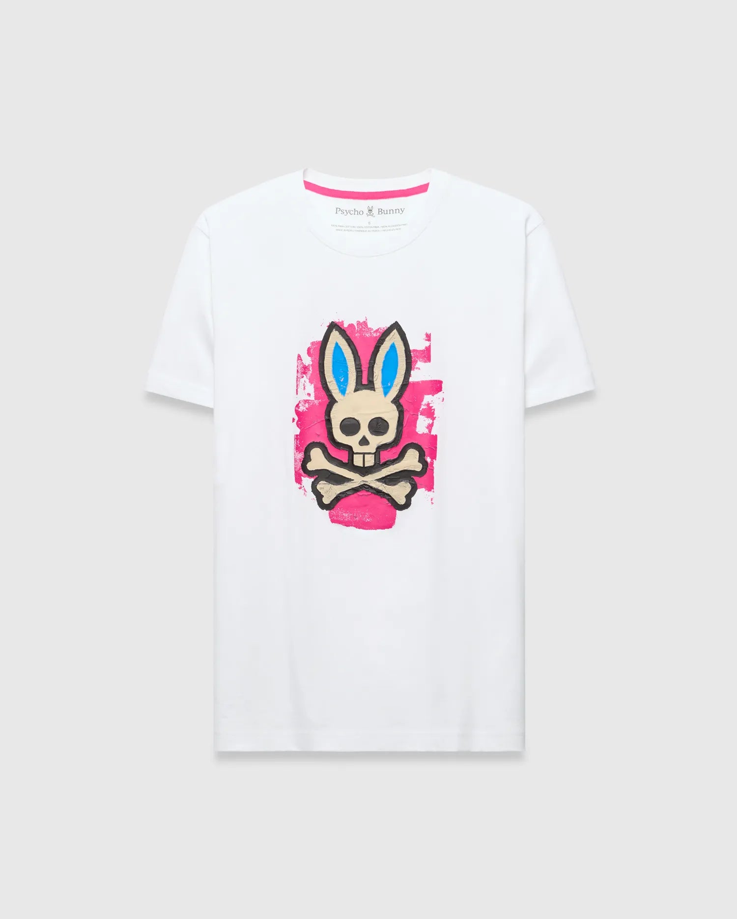 Mens Marcus Bunny Graphic Tee, white classic fit jersey t-shirt with a large distressed pink, blue, black, and beige Psycho Bunny skull graphic on the chest and pink neck tape.