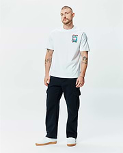 Mens Isaac Relaxed Fit Tee in white soft jersey, featuring a relaxed fit and a vibrant, multi-color Psycho Bunny skull and crossbones graphic print on the left chest.