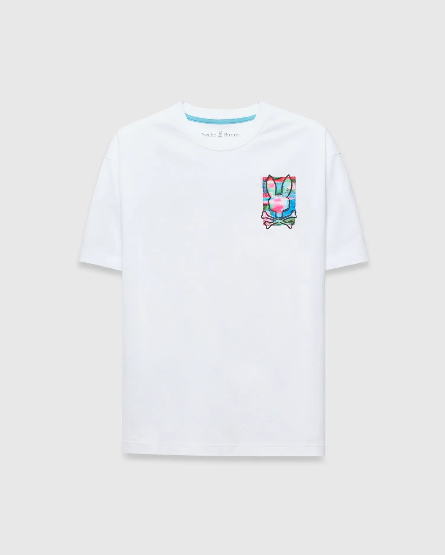 Mens Isaac Relaxed Fit Tee, a white jersey t-shirt with a relaxed fit, featuring a vibrant multi-color graphic Psycho Bunny skull logo on the left chest and a blue inner neck stripe.