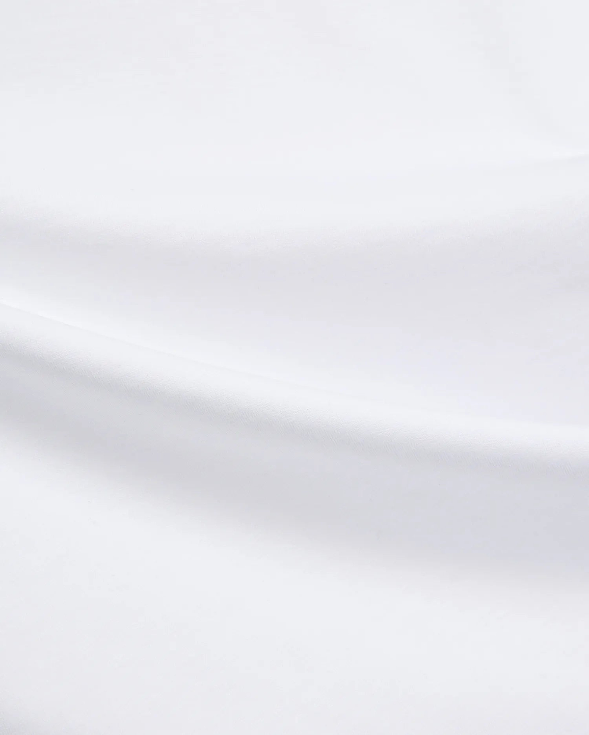 Mens Isaac Relaxed Fit Tee in crisp white, showcasing its smooth, high-quality jersey fabric texture. A versatile premium streetwear essential designed for ultimate comfort.