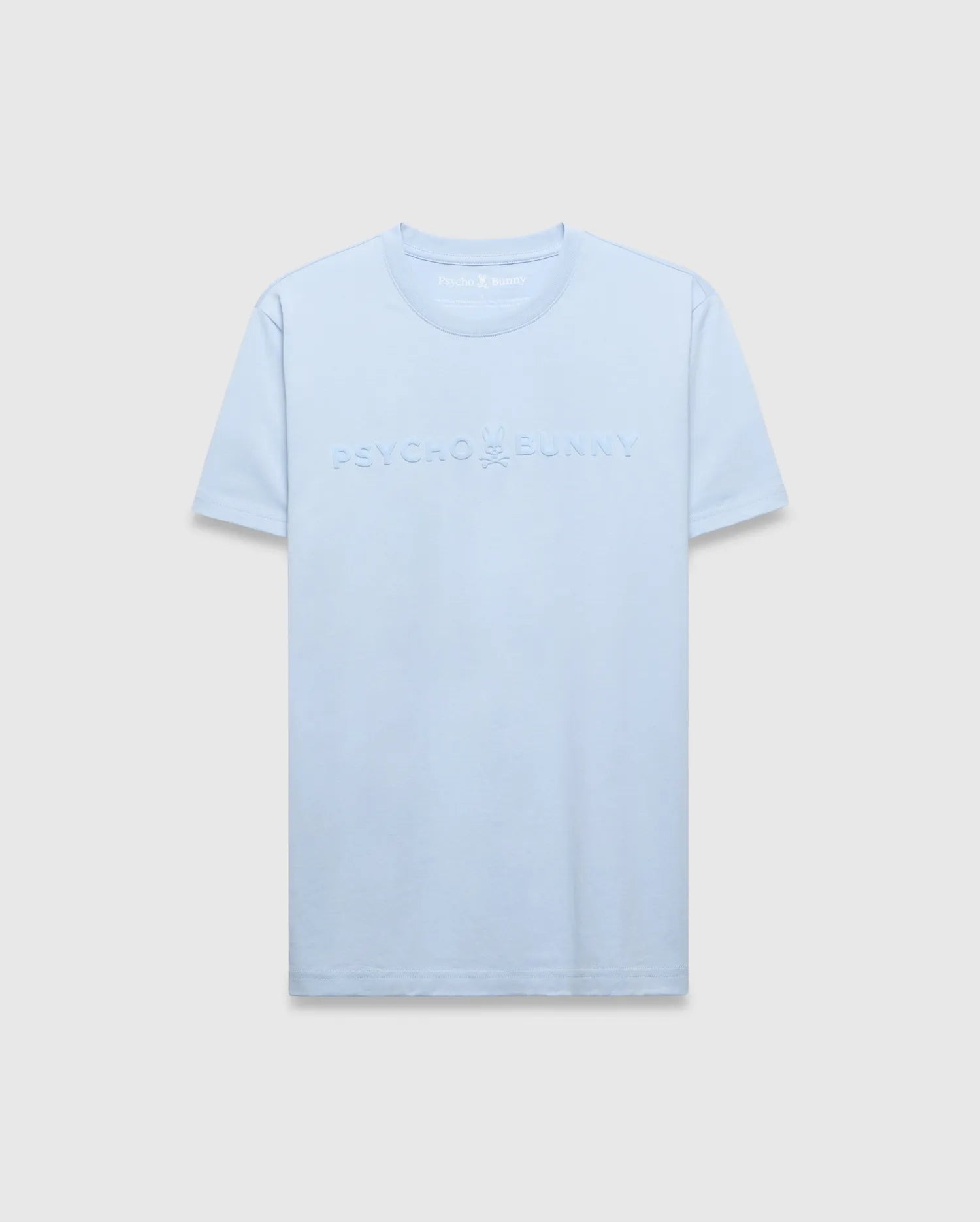 Mens Royce Graphic Tee in light blue, featuring a classic fit and smooth jersey knit fabric. A large, embossed Psycho Bunny text logo with the iconic skull graphic is centered on the chest.