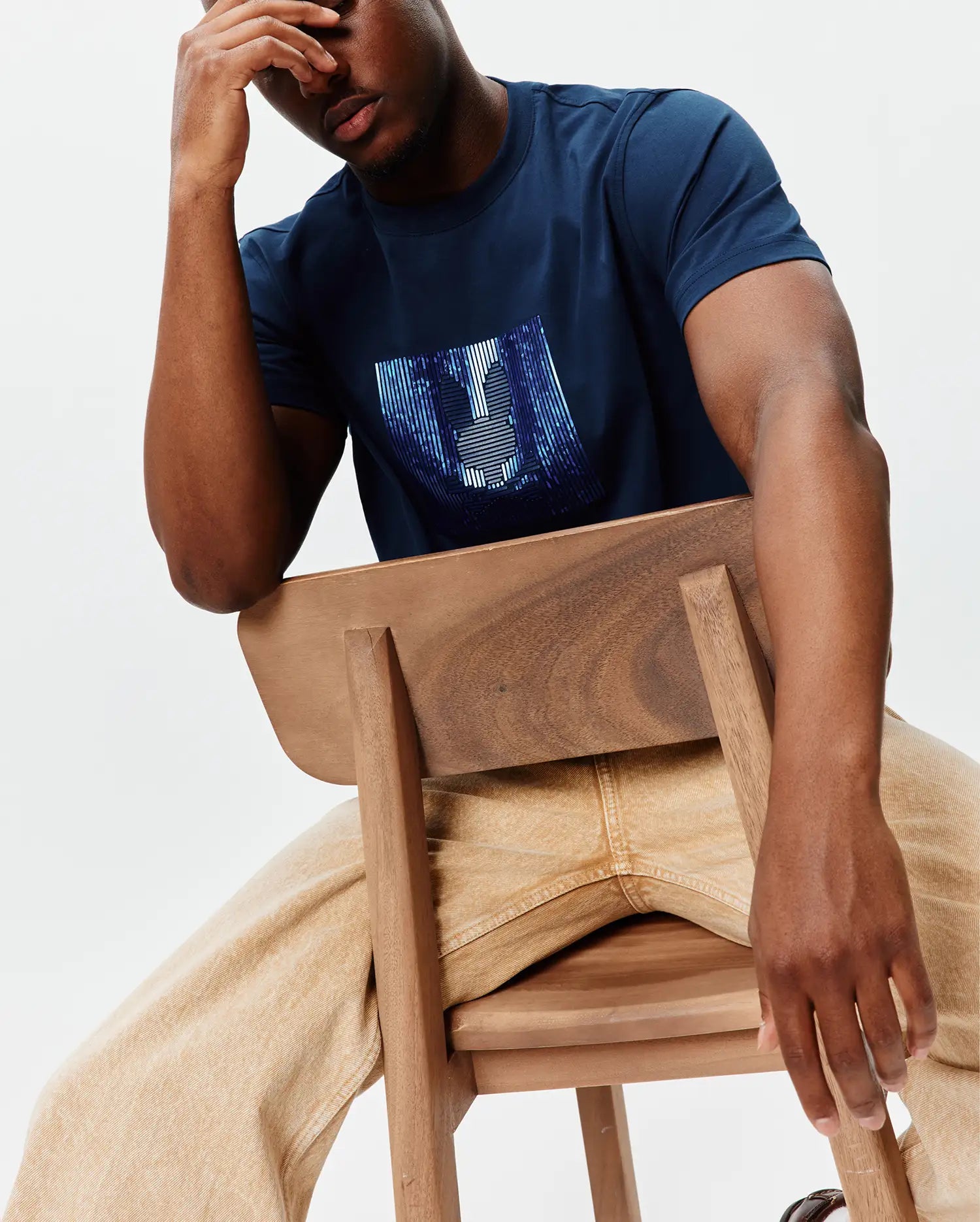 Premium Mens Seamus Graphic Tee in navy blue, featuring a large, abstract blue and white striped bunny skull graphic on the chest, made from soft jersey fabric with a classic fit.