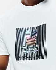 Mens Langston Graphic Tee, a white classic fit jersey t-shirt with a large central graphic featuring a black vertical striped background and a multicolored iridescent Psycho Bunny skull logo and brand name.