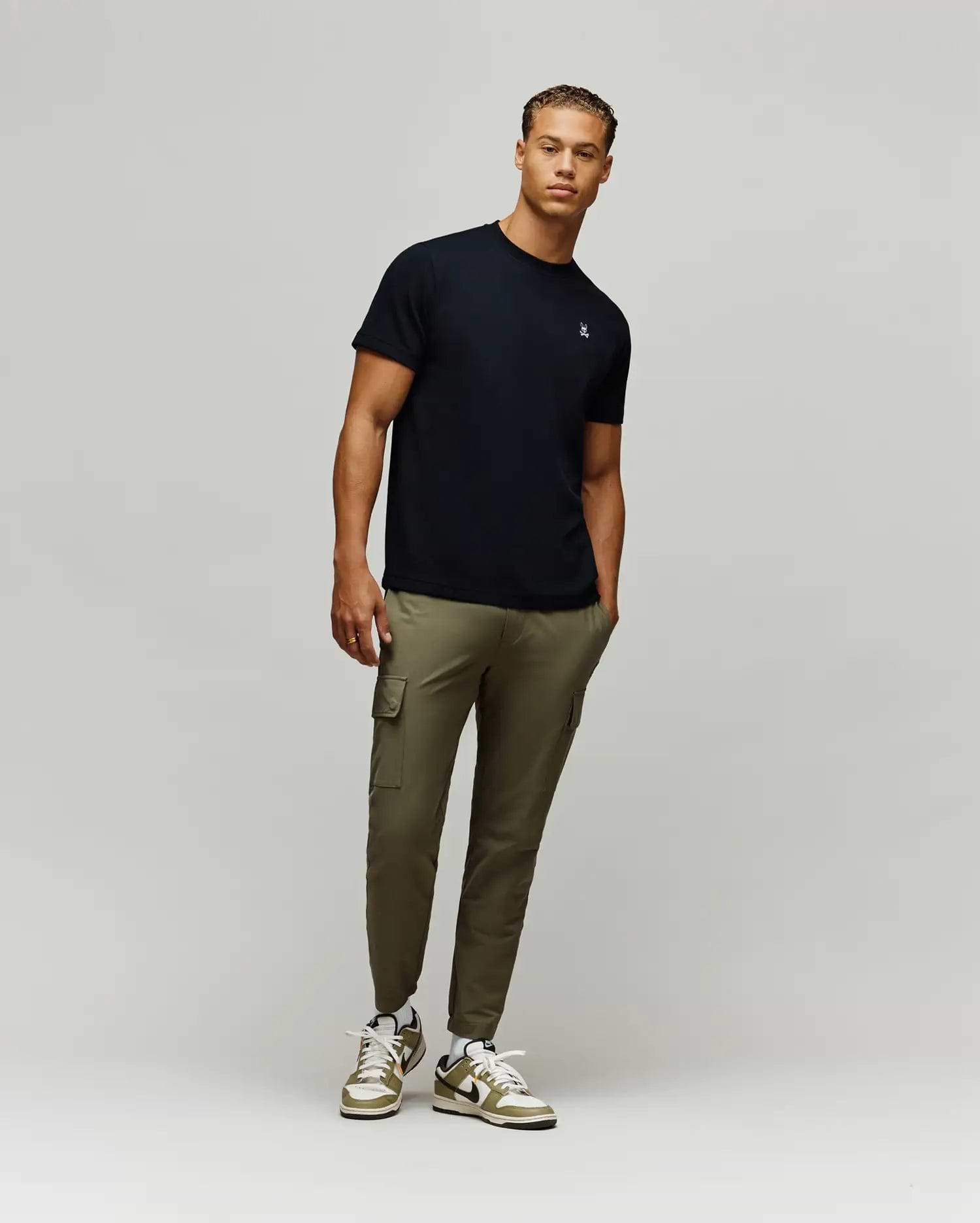 Black Mens Maxton Waffle Tee, a premium classic fit garment, showcasing the iconic small embroidered white and light blue Psycho Bunny skull logo on the left chest.