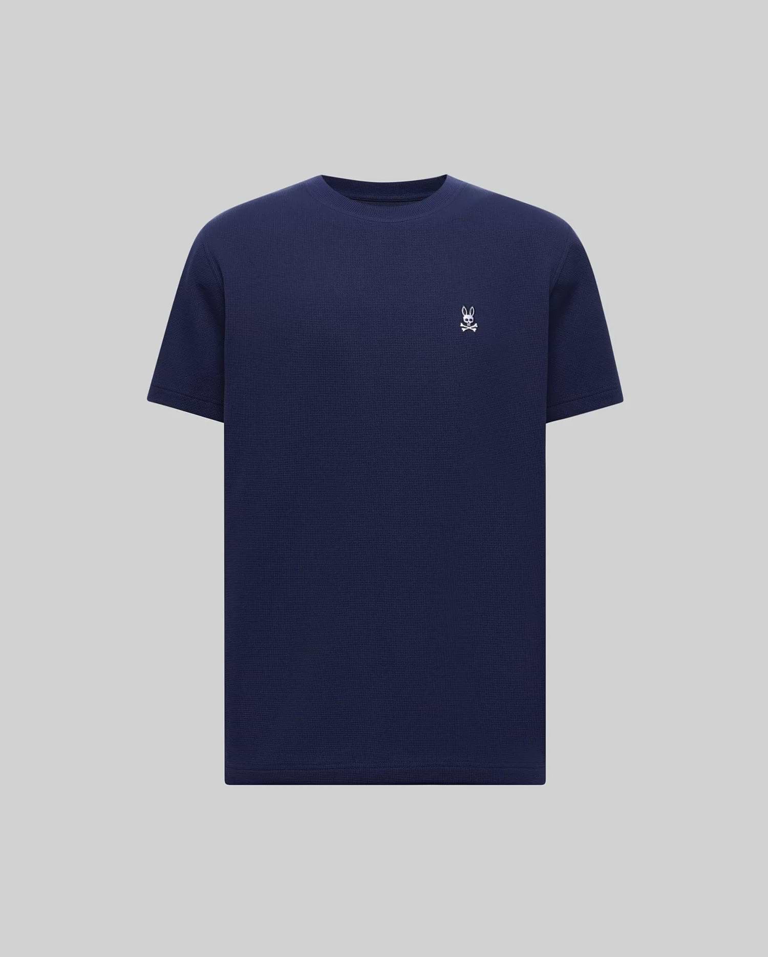 Mens Maxton Waffle Tee in navy, featuring a classic fit and waffle knit texture. Small white embroidered Psycho Bunny skull logo on the left chest.