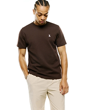 Men's Maxton Waffle Tee, a classic fit brown waffle knit t-shirt featuring a small embroidered white Psycho Bunny skull logo on the left chest. (1)