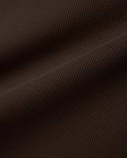 Men's Maxton Waffle Tee in a deep, luxurious dark brown, featuring a prominent and textured waffle knit fabric with subtle folds, highlighting its premium quality. (5)