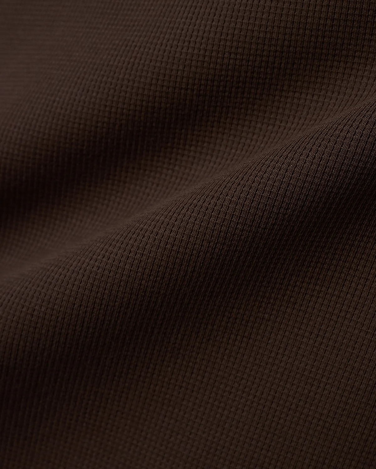 Men's Maxton Waffle Tee in a deep, luxurious dark brown, featuring a prominent and textured waffle knit fabric with subtle folds, highlighting its premium quality. (5)