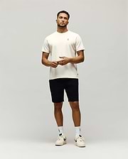 Cream Mens Maxton Waffle Tee, a classic fit t-shirt with a visible waffle knit texture and a small, embroidered black Psycho Bunny skull logo on the left chest.