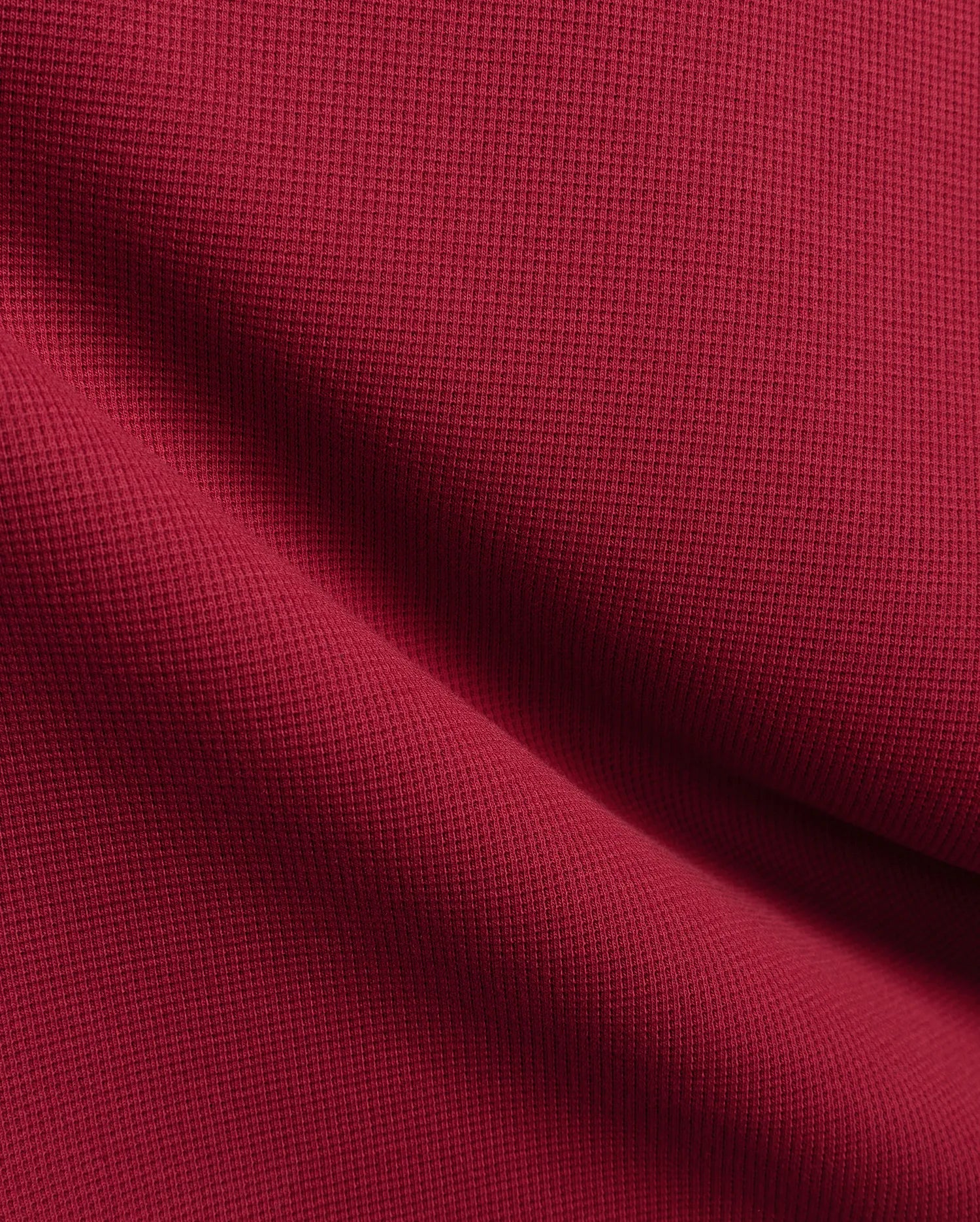 Burgundy Mens Maxton Waffle Tee, a premium streetwear staple crafted from soft, breathable waffle knit fabric, showcasing rich texture and the iconic small embroidered Psycho Bunny skull logo on the left chest.