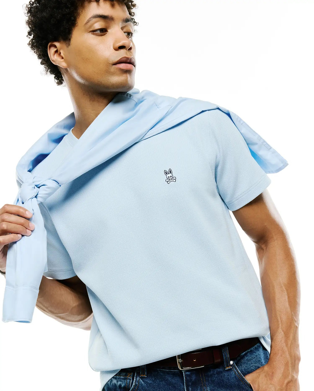 Mens Maxton Waffle Tee in light blue, featuring a classic fit and textured waffle knit fabric, with a small embroidered Psycho Bunny skull logo on the left chest.