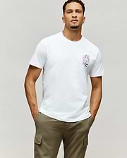Mens Skull Bunny Graphic Tee: White classic fit jersey t-shirt featuring a vertical pink and black Psycho Bunny skull graphic with SKULL BUNNY text on the left chest.