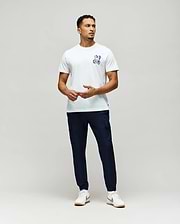 Mens Psycho Skull Graphic Tee, a classic fit white jersey t-shirt featuring a small blue, white, and pink bunny skull logo on the left chest.