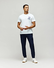 Mens Psycho Skull Graphic Tee, a classic fit white jersey t-shirt featuring a small blue, white, and pink bunny skull logo on the left chest.