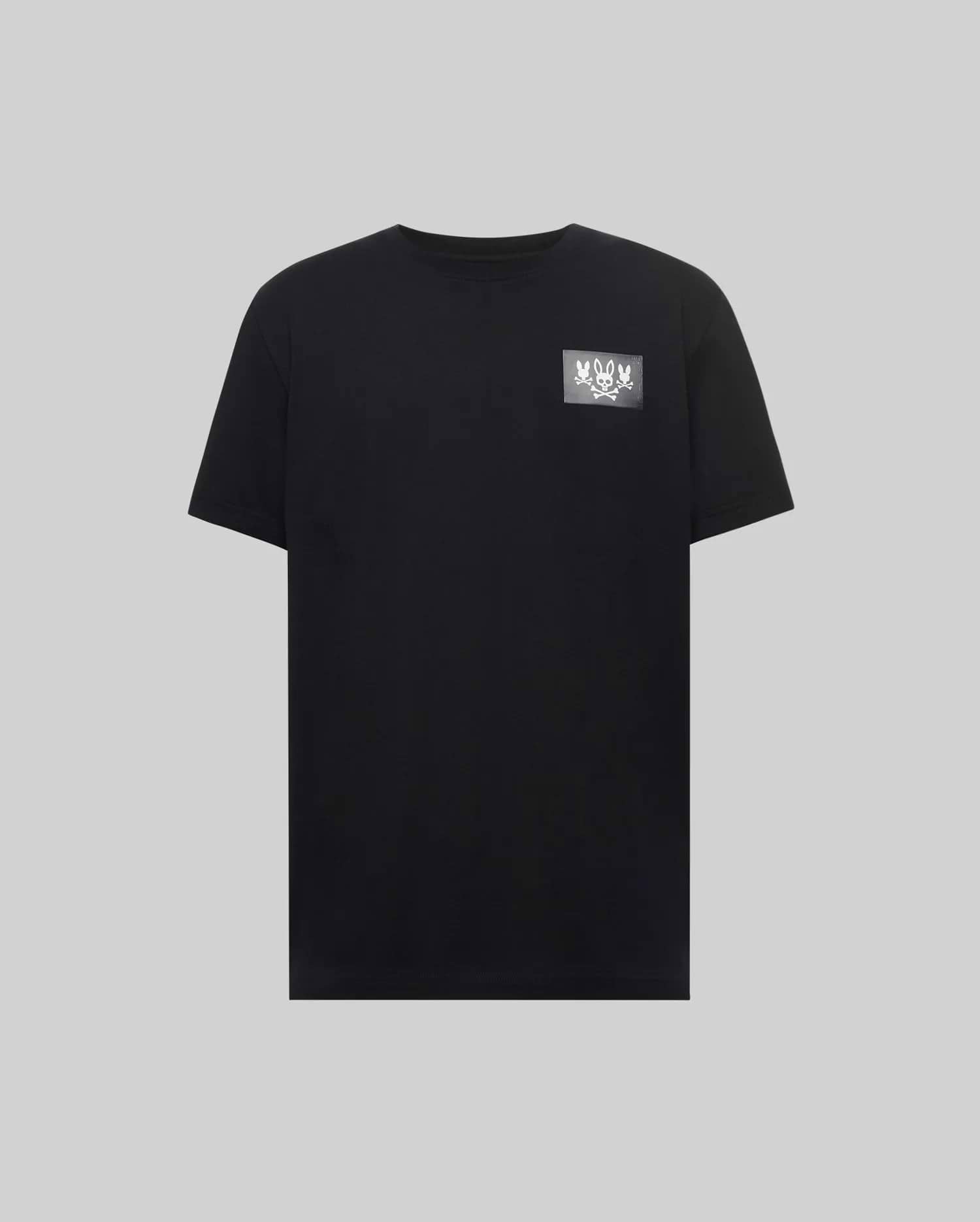 Mens Jarvis Chest Graphic Tee. Black classic fit jersey t-shirt with a small white Psycho Bunny skull and multiple bunny skulls graphic print on the left chest.