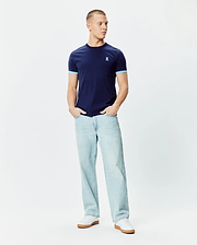 Mens Holden Tee, navy blue jersey t-shirt with light blue contrast ribbed cuffs and a small embroidered Psycho Bunny skull logo on the left chest, classic fit. (4)