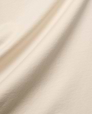 Mens Holden Tee, a premium quality t-shirt in a soft, light beige cotton jersey knit, featuring a smooth texture and elegant drape, characteristic of refined streetwear.