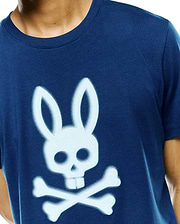 Mens Emmanuel Graphic Tee, a classic fit navy blue jersey t-shirt featuring a large, light blue spray-painted Psycho Bunny skull and crossbones graphic on the center chest.