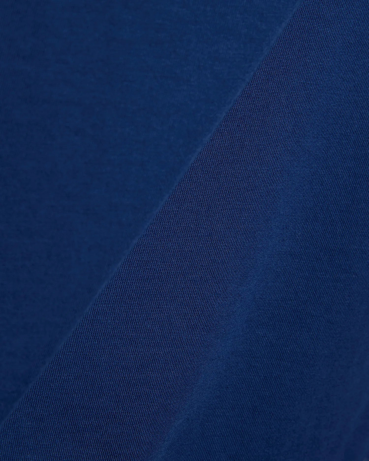 Mens Emmanuel Graphic Tee in rich navy blue, showcasing a soft, smooth jersey fabric on the main body, complemented by a finely textured, diagonal ribbed knit detail.