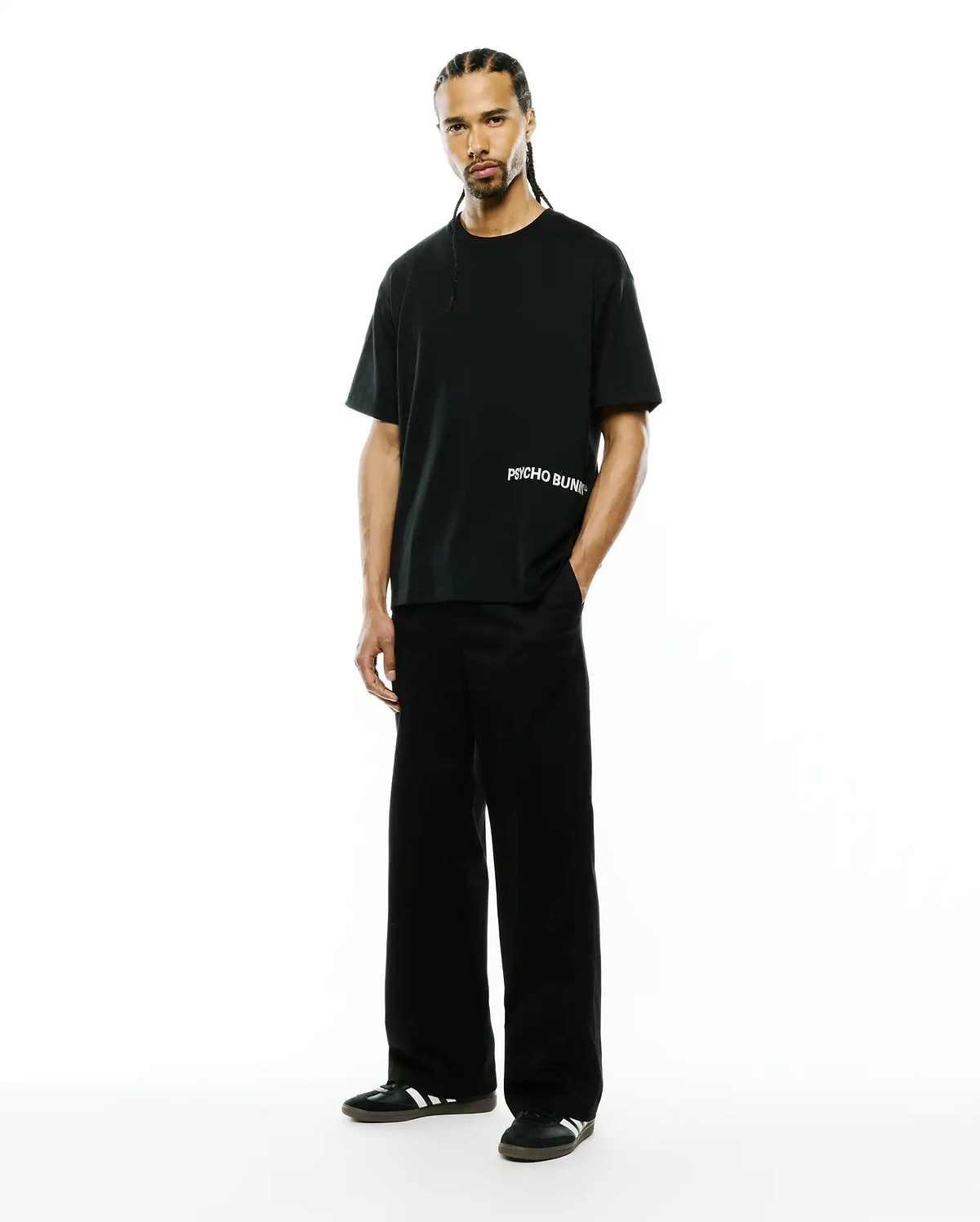 Mens Haiden Relaxed Heavy Weight Tee, black, featuring a relaxed fit and smooth heavy weight jersey fabric, with a white horizontal Psycho Bunny text logo on the left chest.