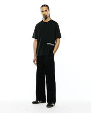 Mens Haiden Relaxed Heavy Weight Tee, black, featuring a relaxed fit and smooth heavy weight jersey fabric, with a white horizontal Psycho Bunny text logo on the left chest.