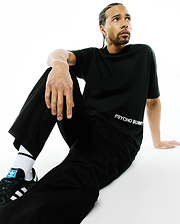 Mens Haiden Relaxed Heavy Weight Tee in black, featuring a relaxed fit and smooth heavy jersey fabric. The white Psycho Bunny text logo is prominently placed on the lower left torso.