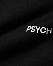 Mens Haiden Relaxed Heavy Weight Tee in black, featuring a visible heavyweight jersey knit texture and white embroidered PSYCH text on the chest.