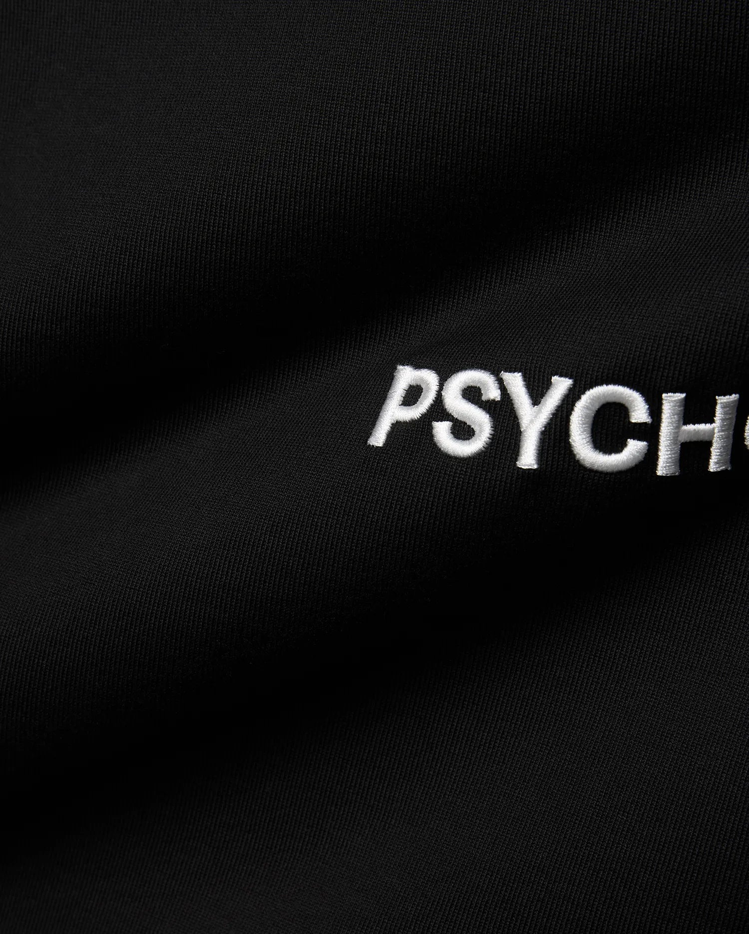 Mens Haiden Relaxed Heavy Weight Tee in black, featuring a visible heavyweight jersey knit texture and white embroidered PSYCH text on the chest.