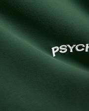 Mens Haiden Relaxed Heavy Weight Tee in dark green, featuring a heavyweight jersey knit texture and a prominent embroidered white Psycho Bunny PSYCH text logo. (6)