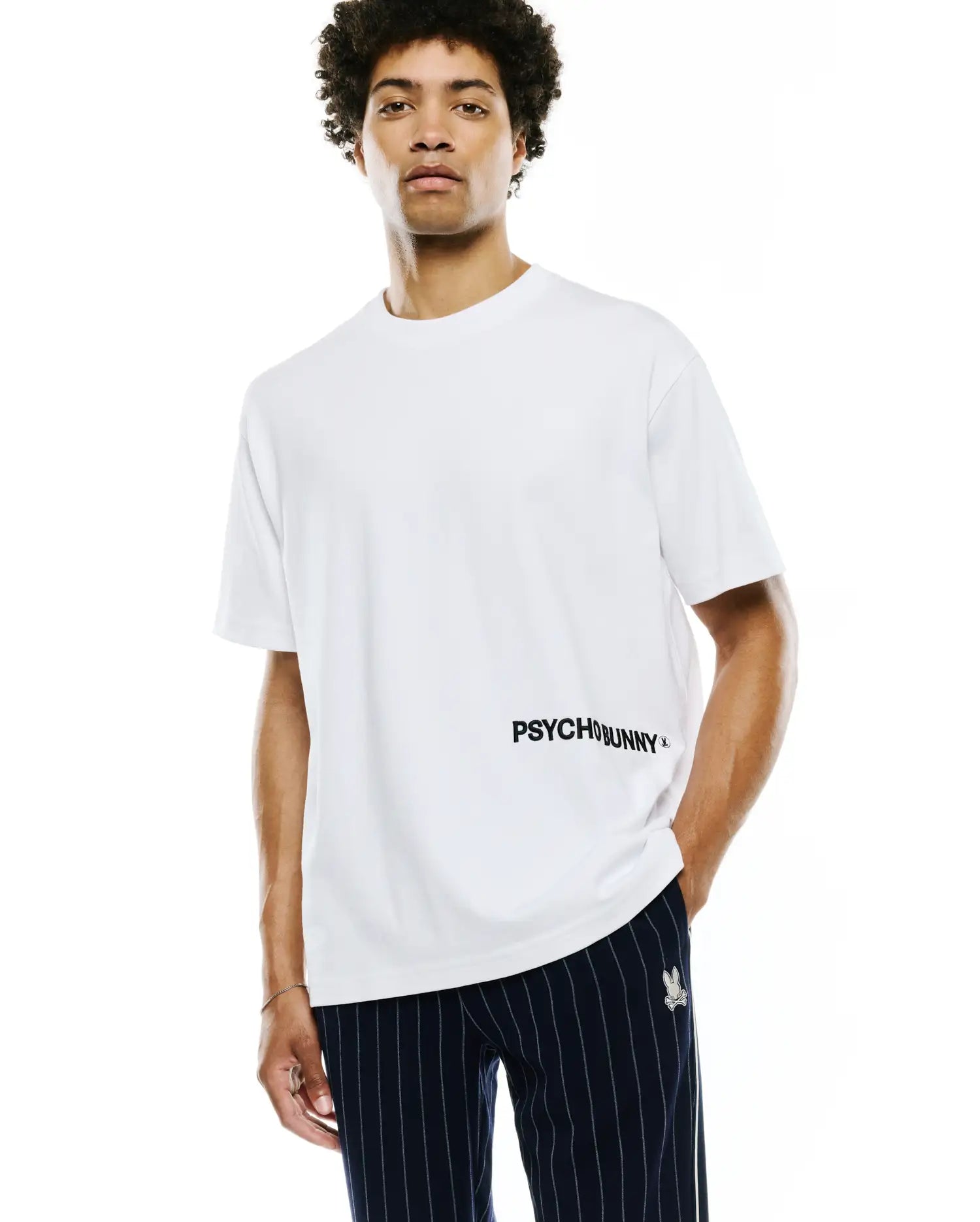 Mens Haiden Relaxed Heavy Weight Tee, white, relaxed fit, heavyweight jersey, featuring large black PSYCHOBUNNY text print with a small bunny skull logo on the lower front.