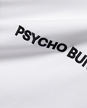 White Mens Haiden Relaxed Heavy Weight Tee, a heavy jersey knit, featuring prominent black embroidered PSYCHO BUNNY text diagonally across the front.