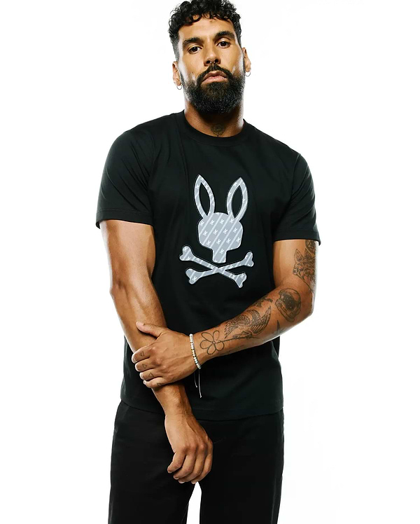 Black classic fit jersey knit Mens Jaden Appliqué Graphic Tee with a large central grey appliquéd Psycho Bunny skull logo featuring a subtle repeating M pattern.