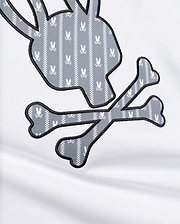 MENS JADEN APPLIQUÉ GRAPHIC TEE featuring a large white jersey fabric with a grey and white patterned bunny skull and crossbones appliqué, outlined in black embroidery.